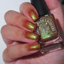 Load image into Gallery viewer, Red holographic microglitter and blue/green shifting shimmer accent a burnt orange jelly base.