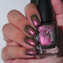 Load image into Gallery viewer, A complex red-bronze to gold to green-blue shifting multichrome nail polish filled with gold holographic microglitter