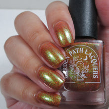 Load image into Gallery viewer, Red holographic microglitter and blue/green shifting shimmer accent a burnt orange jelly base.