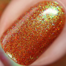 Load image into Gallery viewer, Red holographic microglitter and blue/green shifting shimmer accent a burnt orange jelly base.