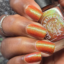 Load image into Gallery viewer, Red holographic microglitter and blue/green shifting shimmer accent a burnt orange jelly base.