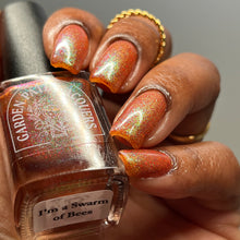Load image into Gallery viewer, Red holographic microglitter and blue/green shifting shimmer accent a burnt orange jelly base.